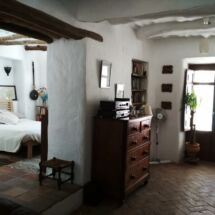 AFTER: Ceiling and walls treated and covered in lime, old floor replaced, door to left room widened. Yasmin new rooms