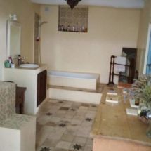 AFTER: Final bathroom with newly fitted old-style Moorish tiles on floor and lime-based stucco on walls. Yasmin bathroom after