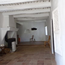 Living room BEFORE improvement and repair works, hole in thin double wall at the end. yasmin-living room-before